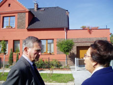 Arnost & Blazena outside the house she lived in as a child with her father, Jan Vella.